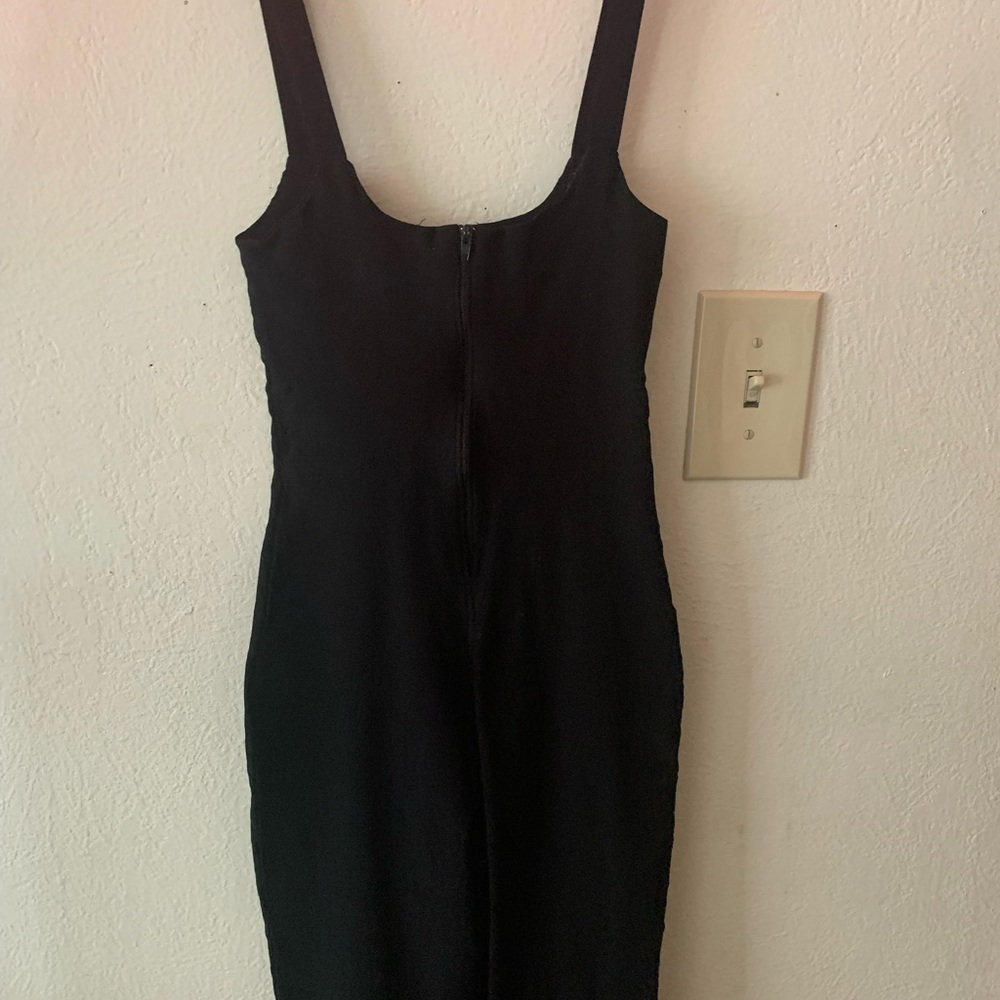 this is a black jumpsuit from fashion nova